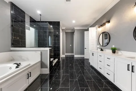 a bedroom with furniture and window