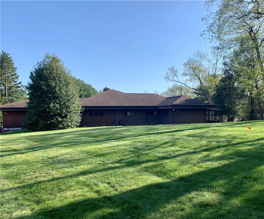 a yard with lots of green space