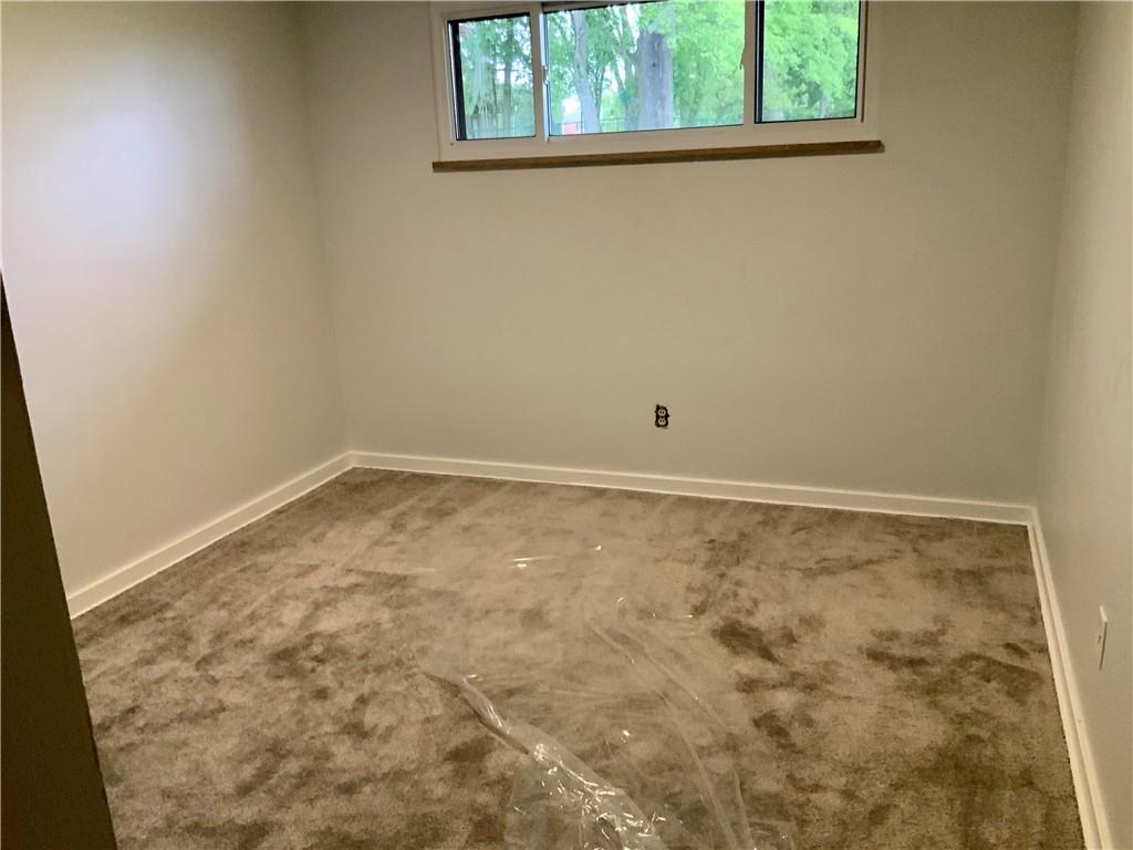 630 Broughton Road Bethel Park, PA 15102 - Photo 12 of 25 an empty room with a window