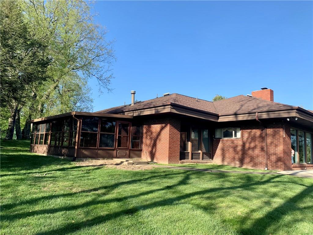 630 Broughton Road Bethel Park, PA 15102 - Photo 2 of 25 a front view of a house with a garden