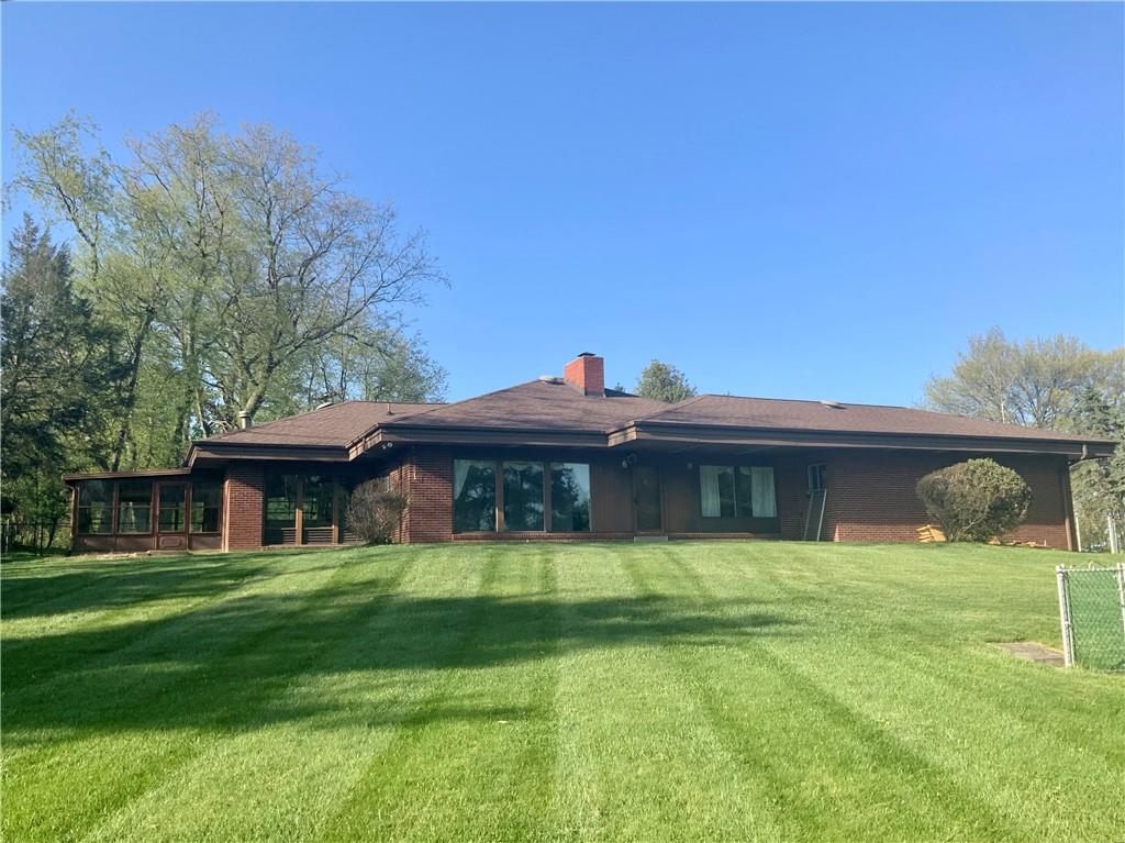 630 Broughton Road Bethel Park, PA 15102 - Photo 3 of 25 a view of a house with a yard