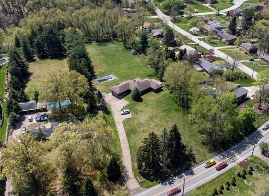 630 Broughton Road Bethel Park, PA 15102 - Photo 9 of 25 a view of a garden with plants and lake view