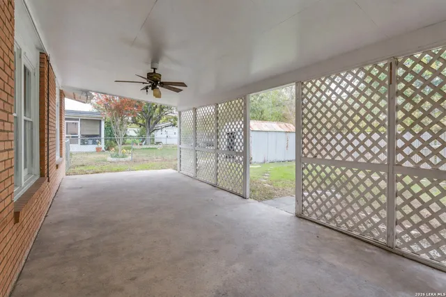 a view of a room with windows