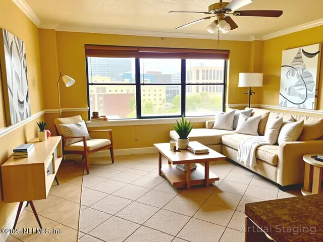 a living room with furniture and a window