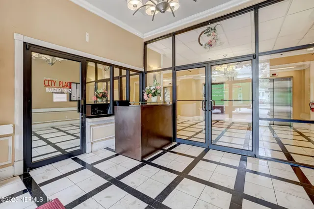 a view of a living room and a balcony