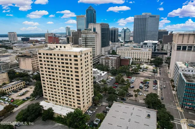 a view of a city with tall buildings