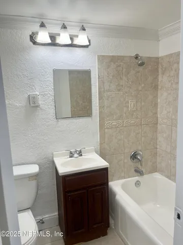 a bathroom with a sink and a toilet