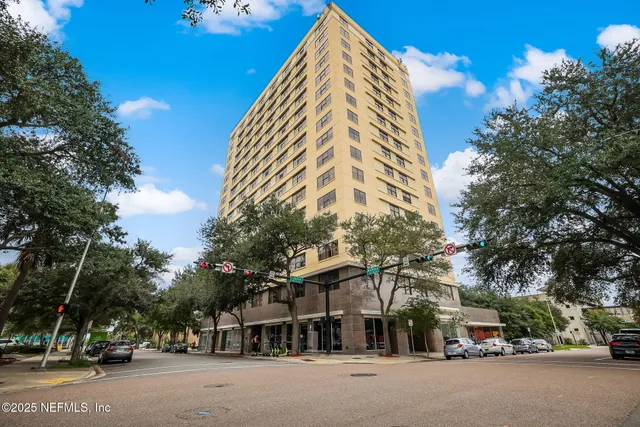 a view of a building with a street