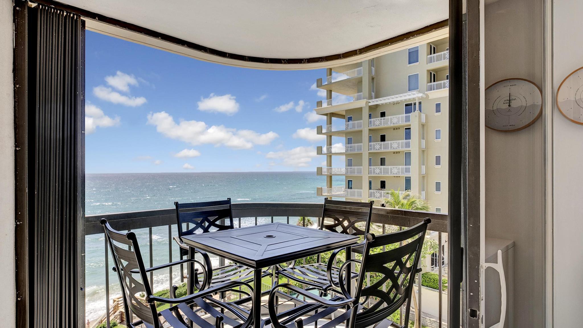 5380 North Ocean Drive, Unit 6C Riviera Beach, FL 33404 - Photo 20 of 33 a balcony view with a seating space