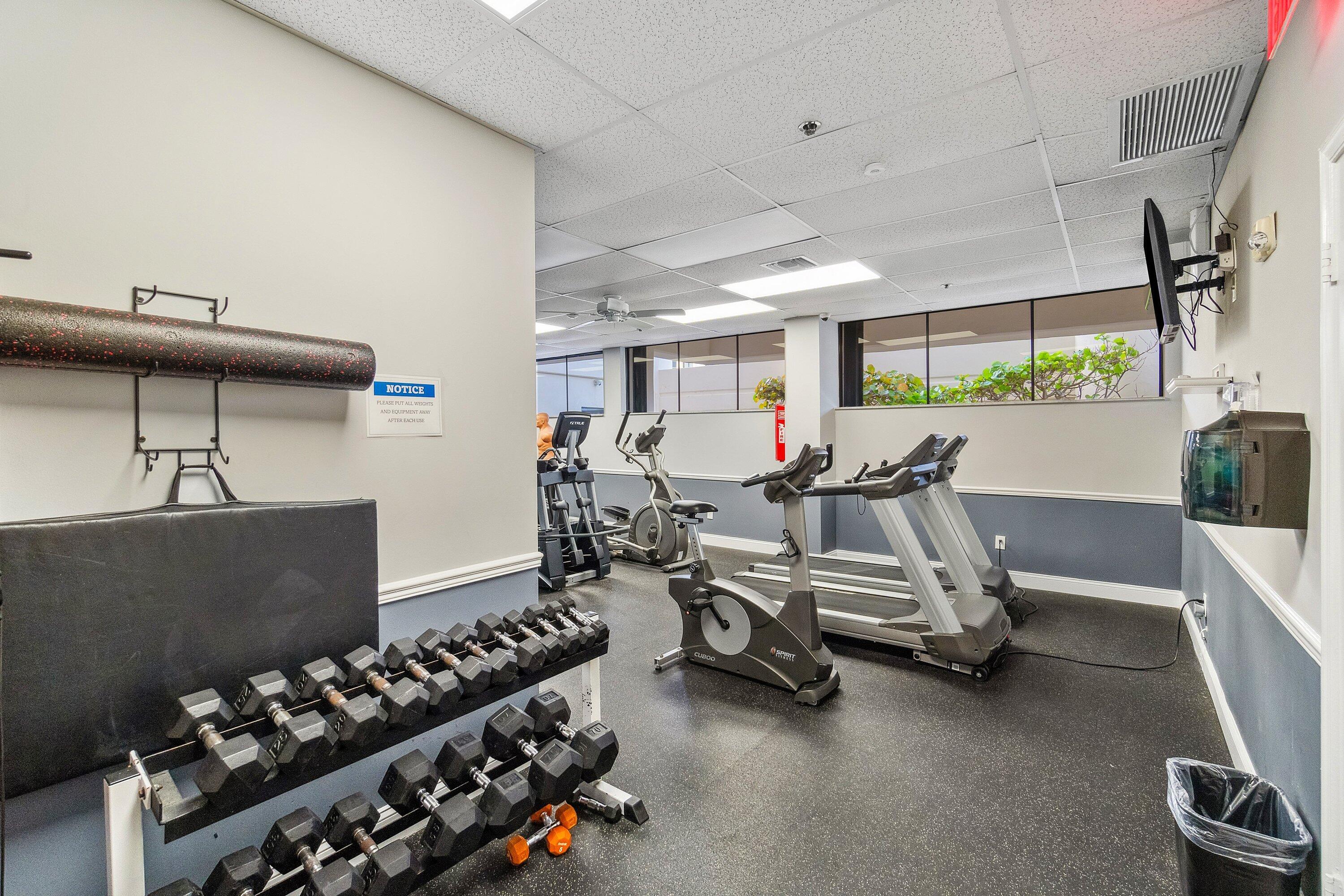 5380 North Ocean Drive, Unit 6C Riviera Beach, FL 33404 - Photo 32 of 33 a view of a room with gym equipment