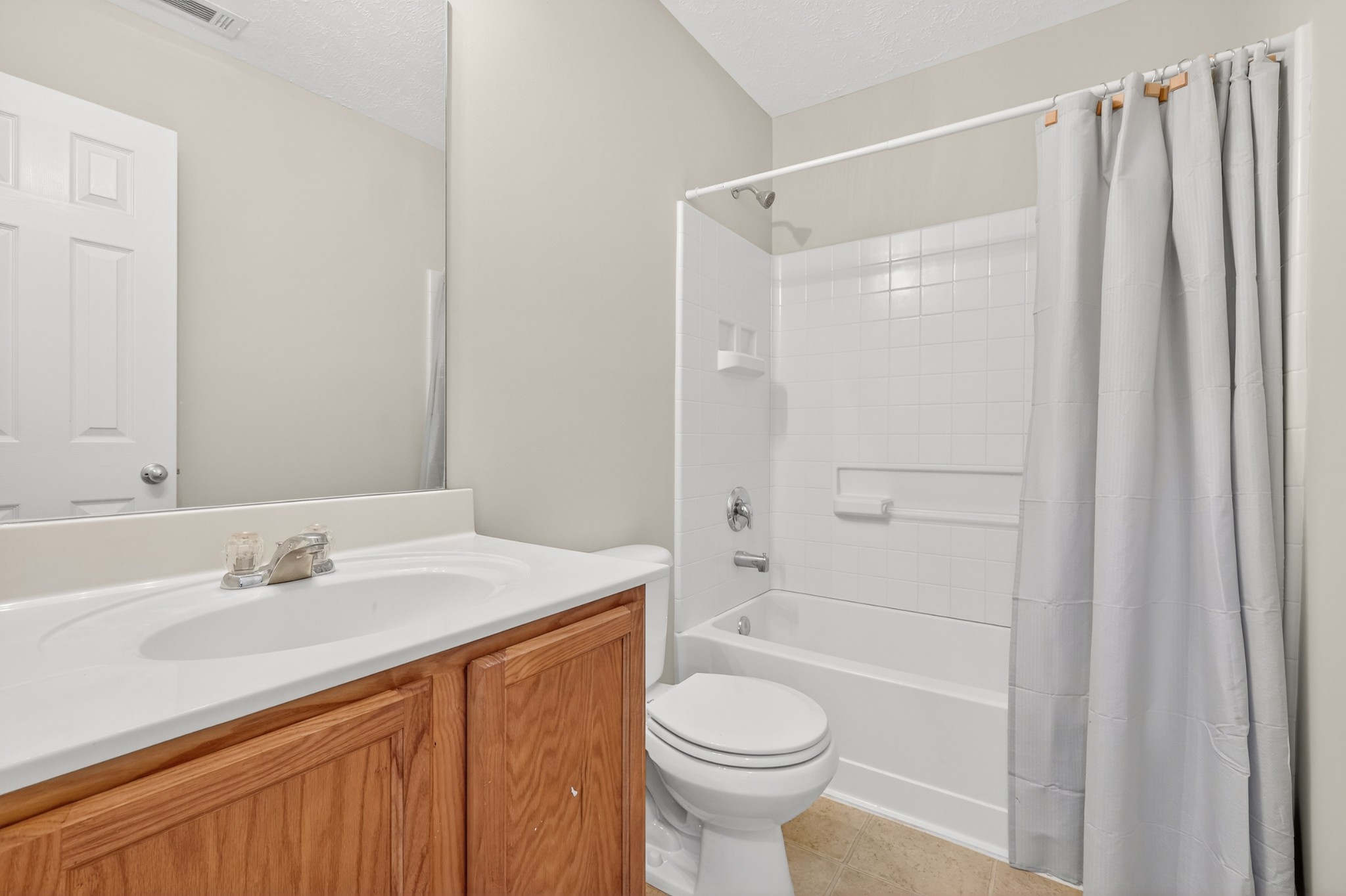 8333 Rossi Road Brentwood, TN 37027 - Photo 15 of 20 a bathroom with a sink a toilet and shower