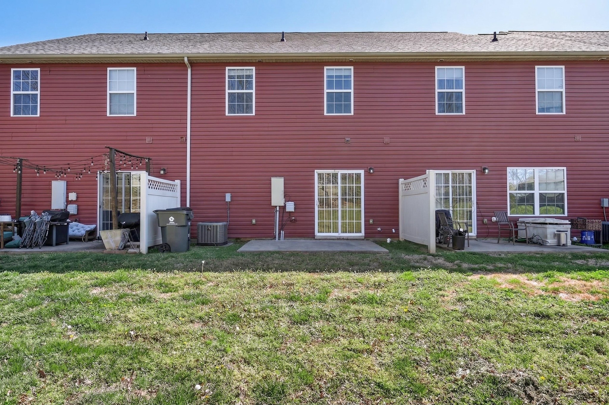 8333 Rossi Road Brentwood, TN 37027 - Photo 19 of 20 a brick house next to a yard with a fountain