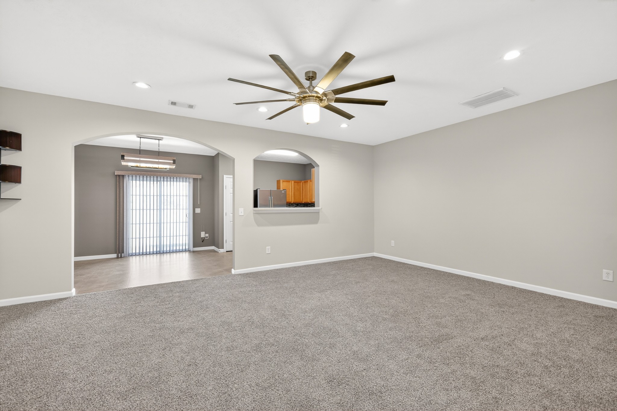 8333 Rossi Road Brentwood, TN 37027 - Photo 4 of 20 wooden floor in an empty room with a window