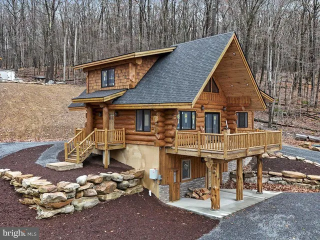 a front view of a house with a porch