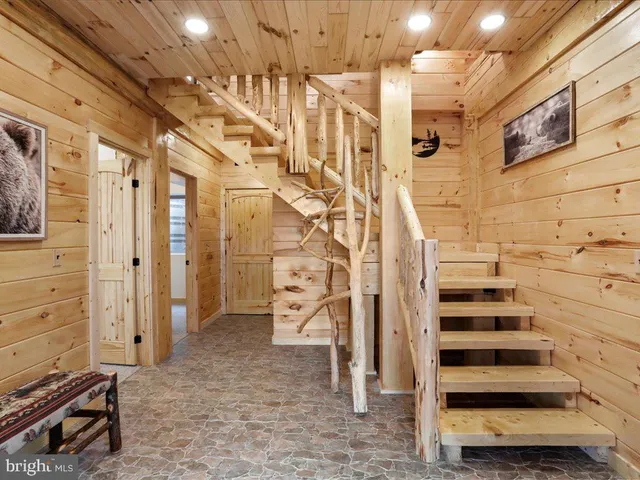 a view of entryway with stairs