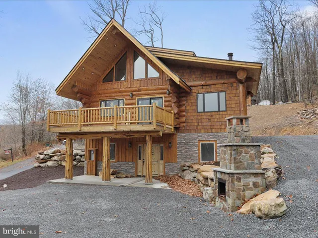 a front view of a house with garage