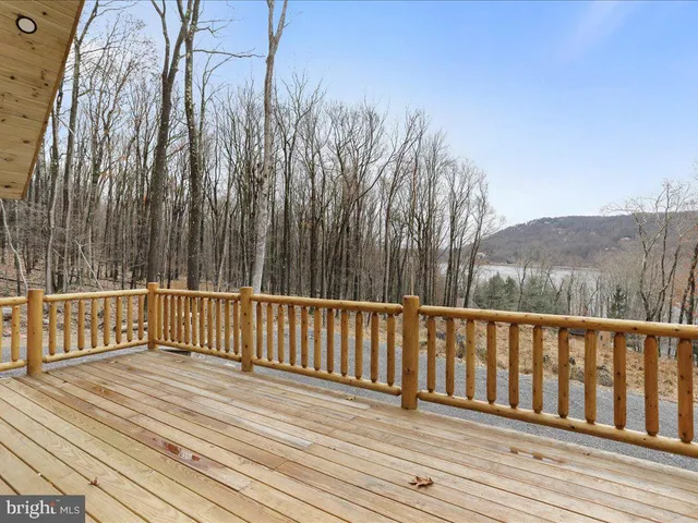 a view of a wooden roof deck