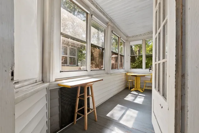 a room with a table and a window