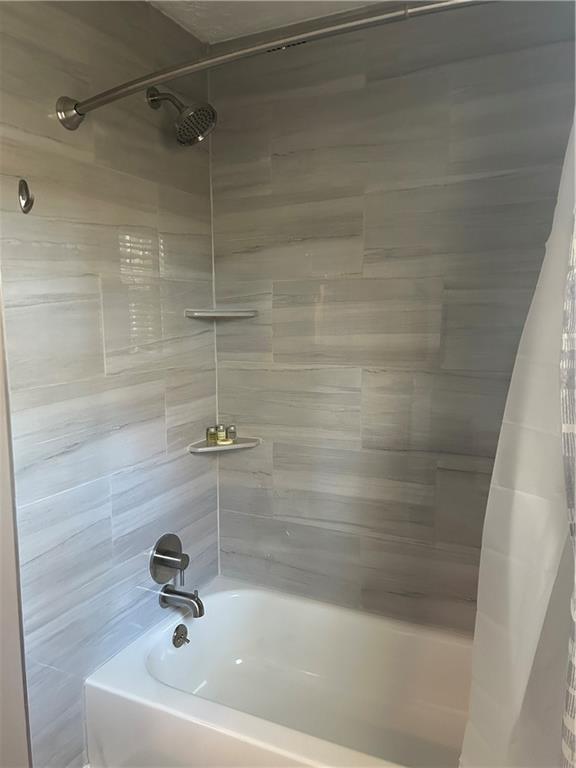 131 Fox Place Canton, GA 30114 - Photo 17 of 29 a bathroom with a shower