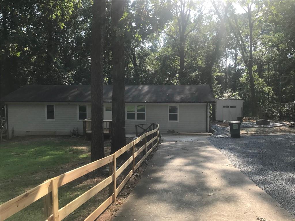 131 Fox Place Canton, GA 30114 - Photo 2 of 29 a view of backyard with green space