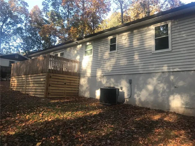 a view of a yard with a tree