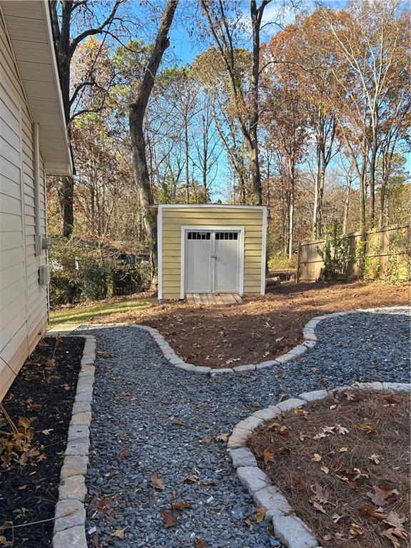 131 Fox Place Canton, GA 30114 - Photo 26 of 29 a view of outdoor space yard and basketball court