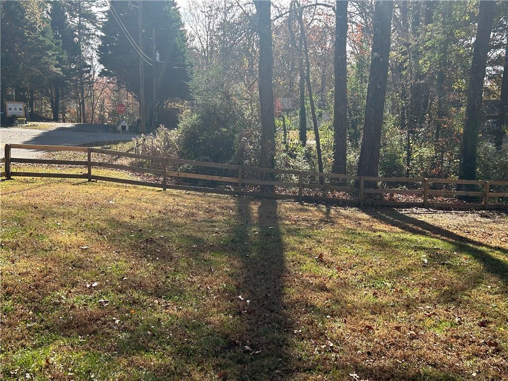 131 Fox Place Canton, GA 30114 - Photo 28 of 29 a view of a yard with trees