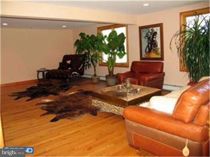 3574 Glenway Road Huntingdon Valley, PA 19006 - Photo 11 of 12 a living room with furniture plant and a large window