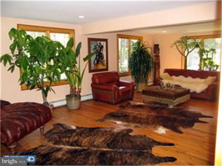 3574 Glenway Road Huntingdon Valley, PA 19006 - Photo 12 of 12 a living room with furniture and a large window