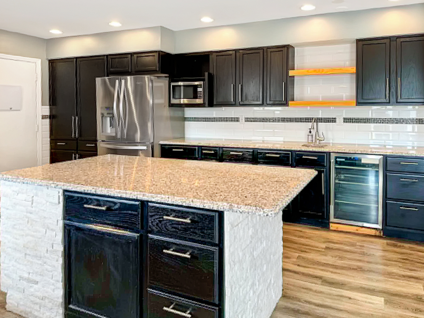 1008 Ascot Drive Rantoul, IL 61866 - Photo 10 of 24 a kitchen with stainless steel appliances a sink and a refrigerator