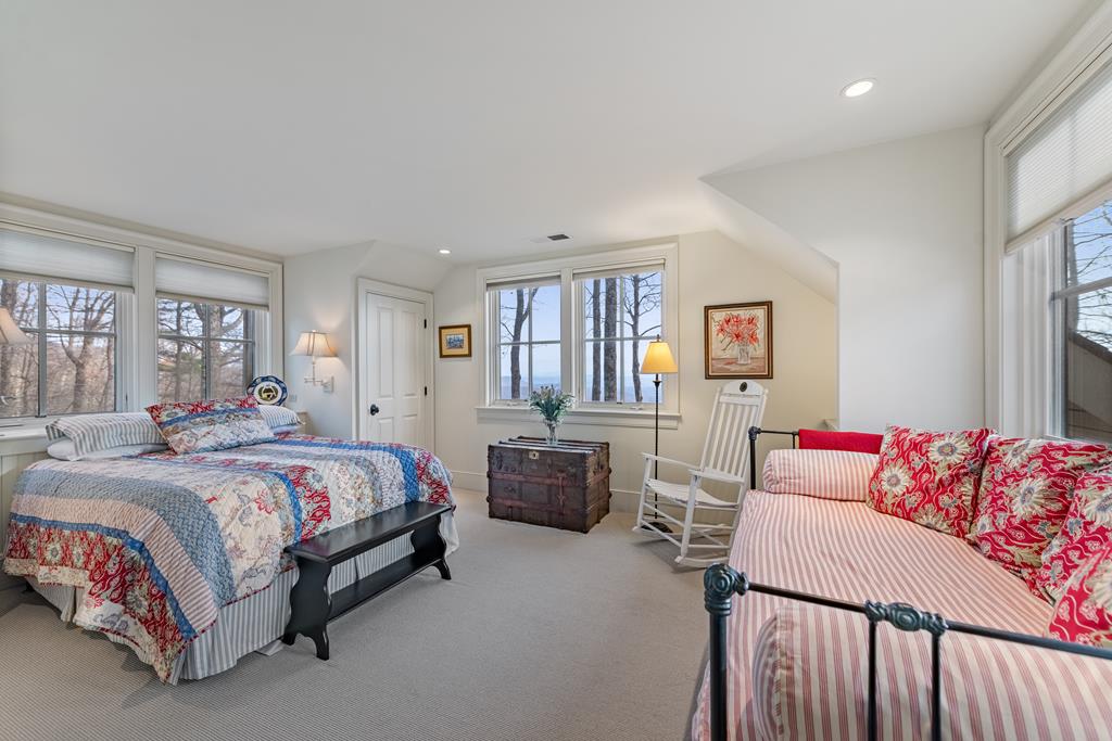 1115 Outlook Road Murphy, NC 28906 - Photo 39 of 60 a bedroom with a bed couch and windows