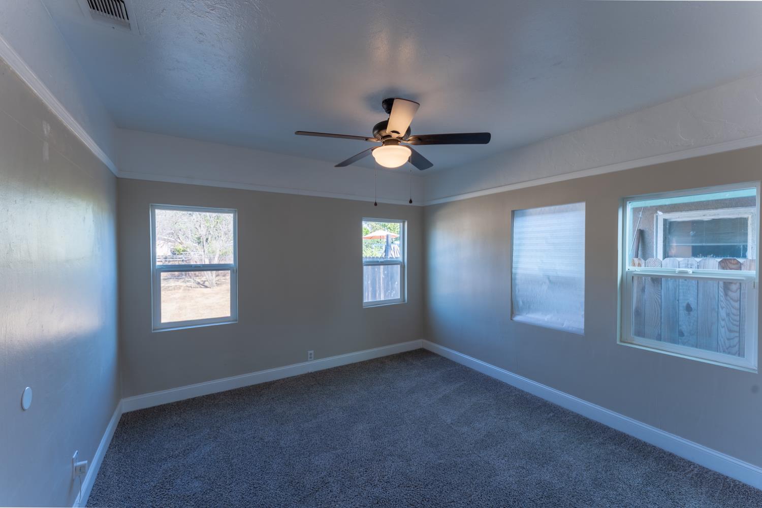 963 North Arthur Avenue Fresno, CA 93728 - Photo 17 of 26 a view of an empty room with a window