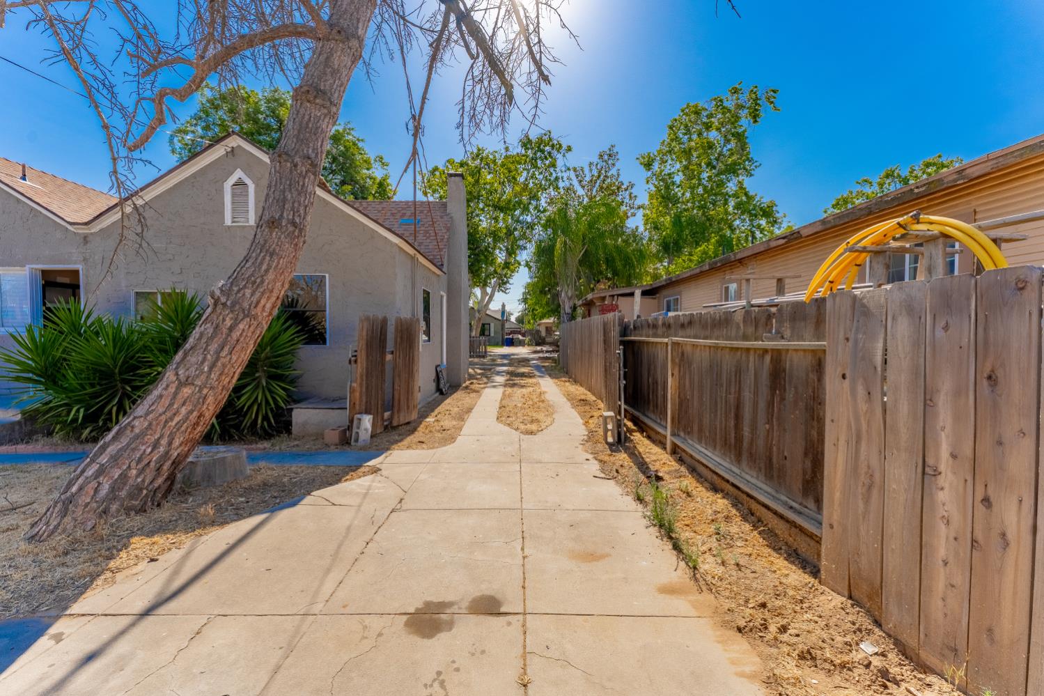 963 North Arthur Avenue Fresno, CA 93728 - Photo 25 of 26 a view of a house with backyard