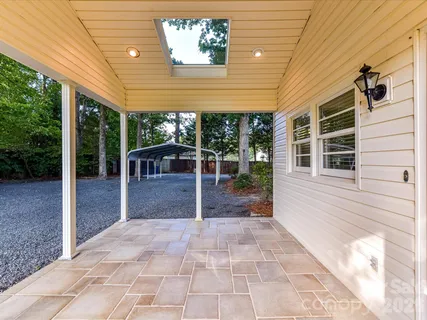 a view of a porch with furniture