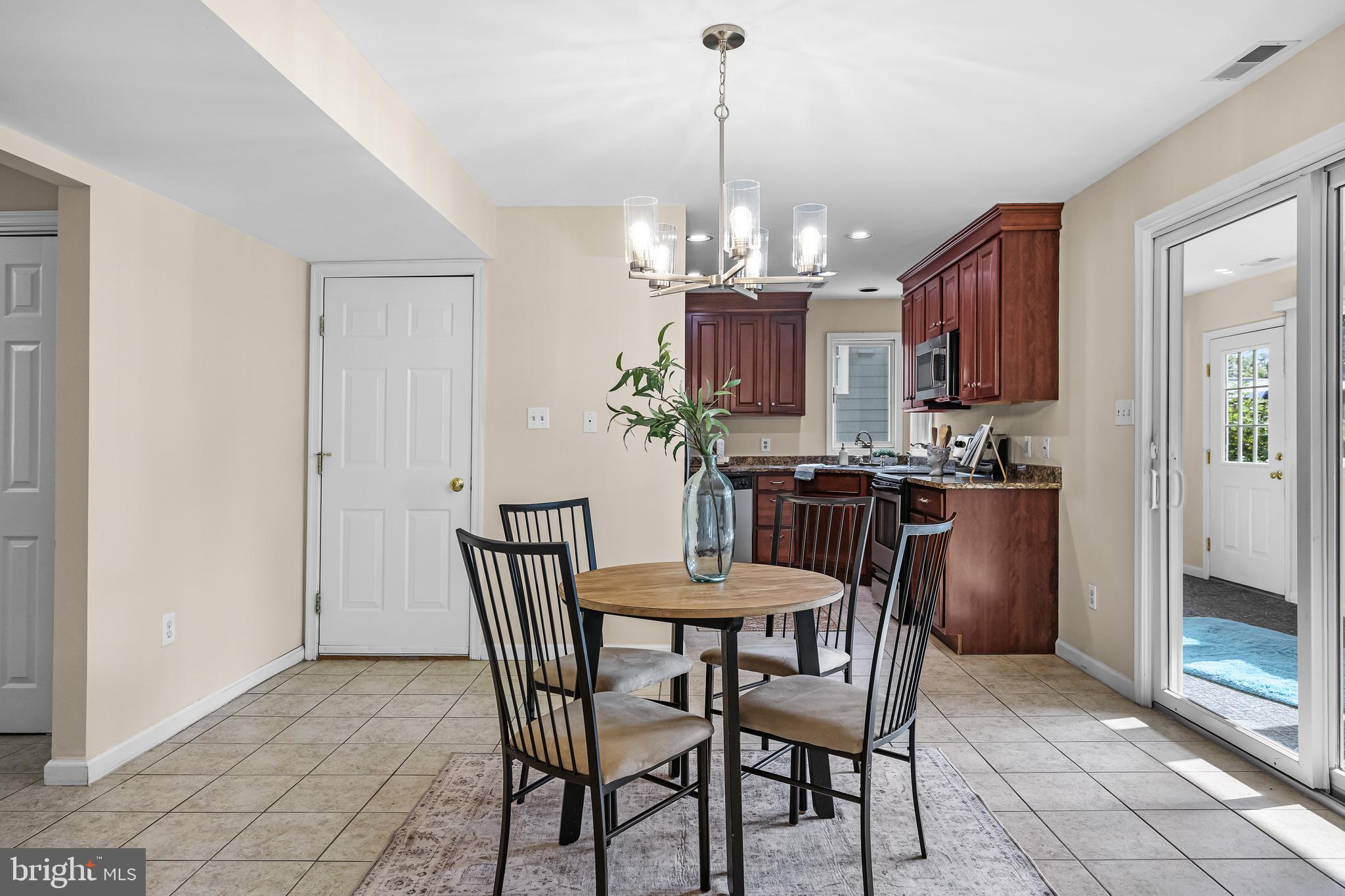 310 South Washington Avenue Moorestown, NJ 08057 - Photo 13 of 37 a view of a dining room with furniture and wooden floor