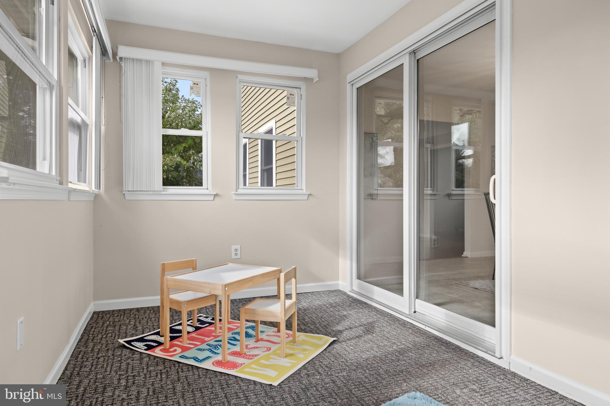 310 South Washington Avenue Moorestown, NJ 08057 - Photo 16 of 37 a living room with a rug and next to a window