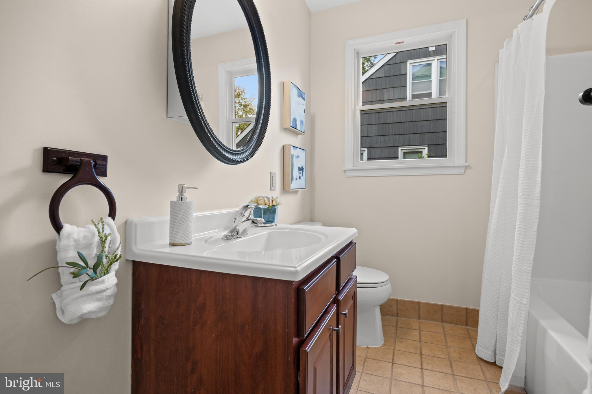 310 South Washington Avenue Moorestown, NJ 08057 - Photo 20 of 37 a bathroom with a sink and a mirror