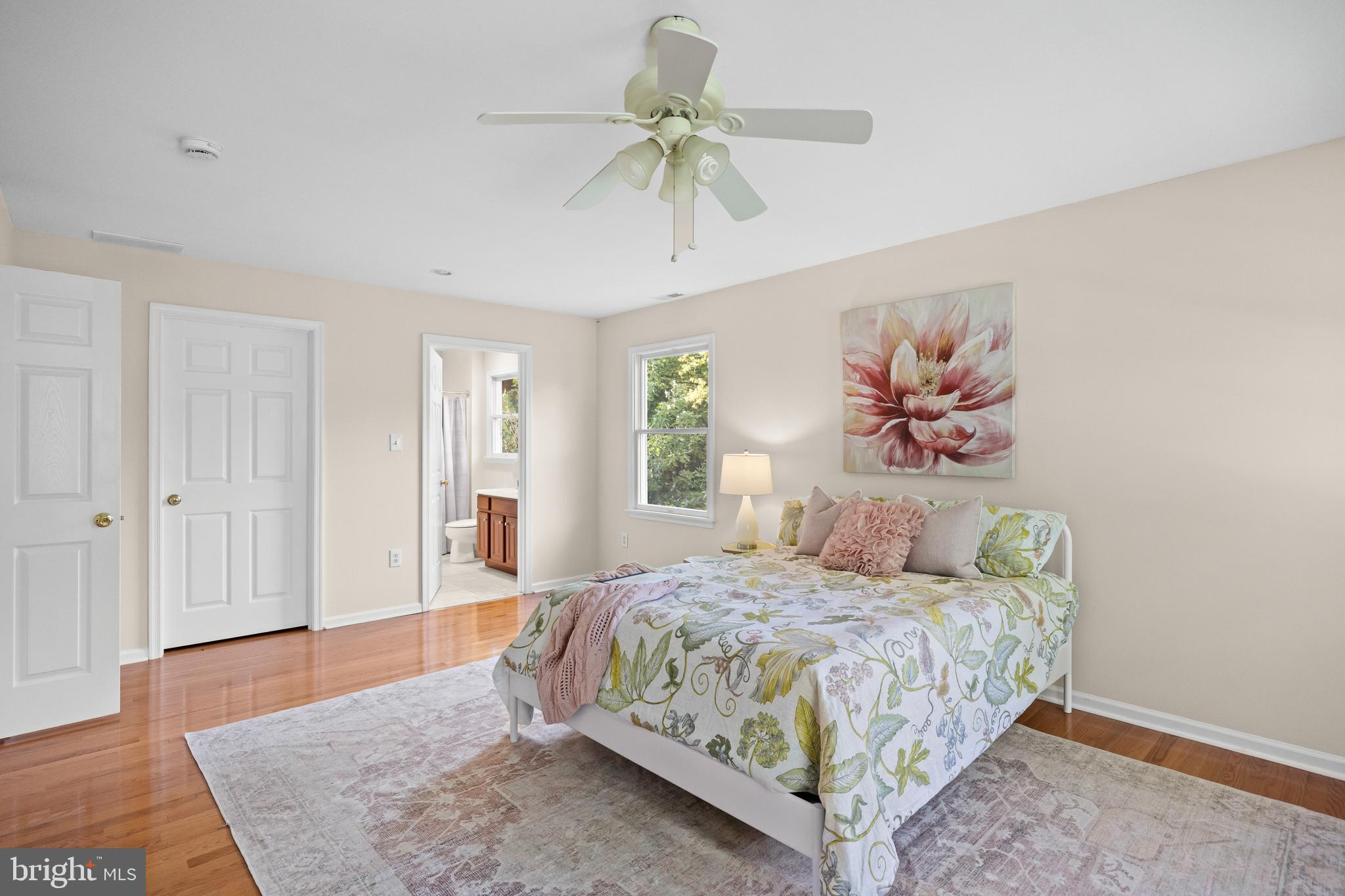 310 South Washington Avenue Moorestown, NJ 08057 - Photo 23 of 37 a bedroom with a bed and a chandelier