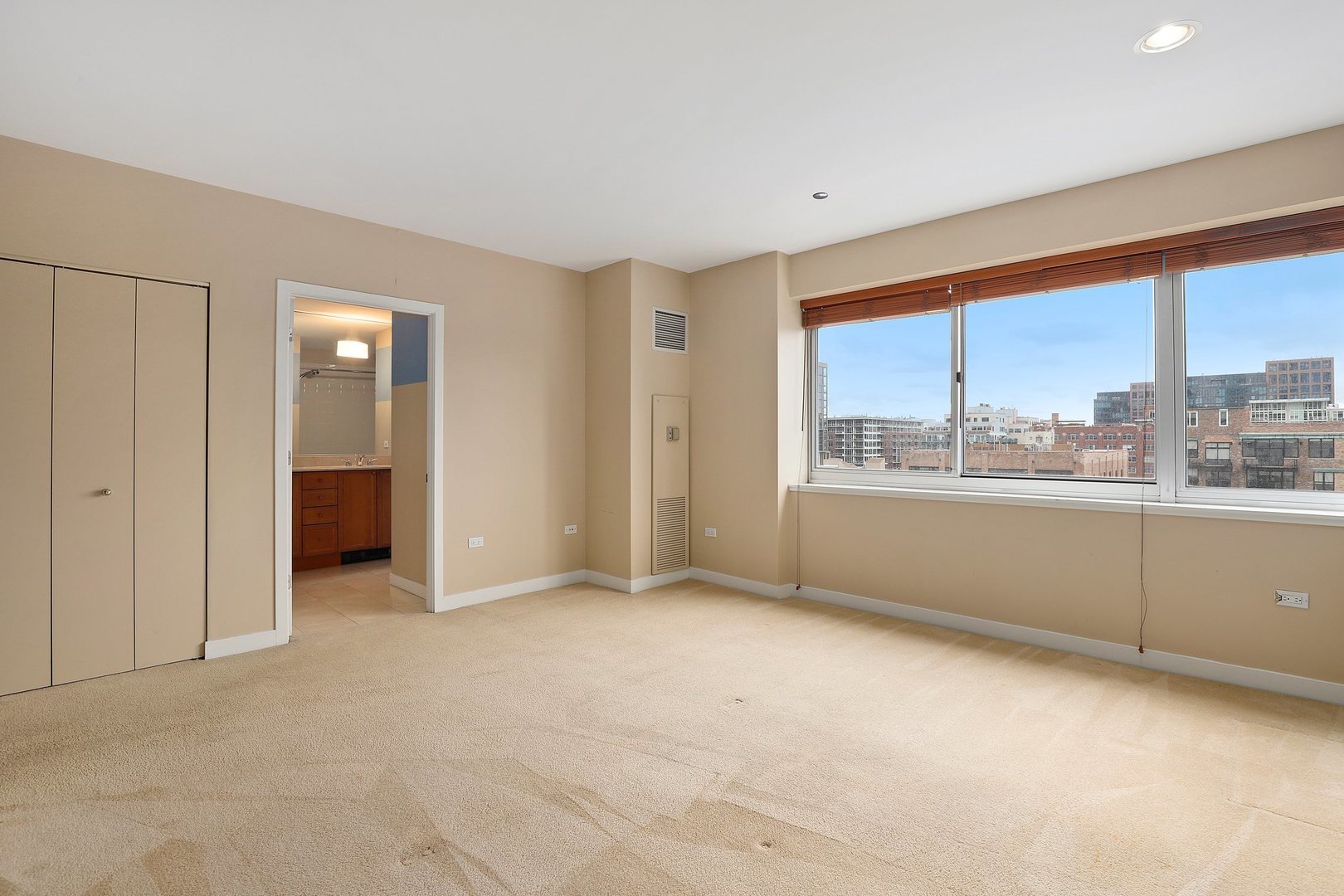 737 West Washington Boulevard, Unit 710 Chicago, IL 60661 - Photo 13 of 28 a view of an empty room with a window