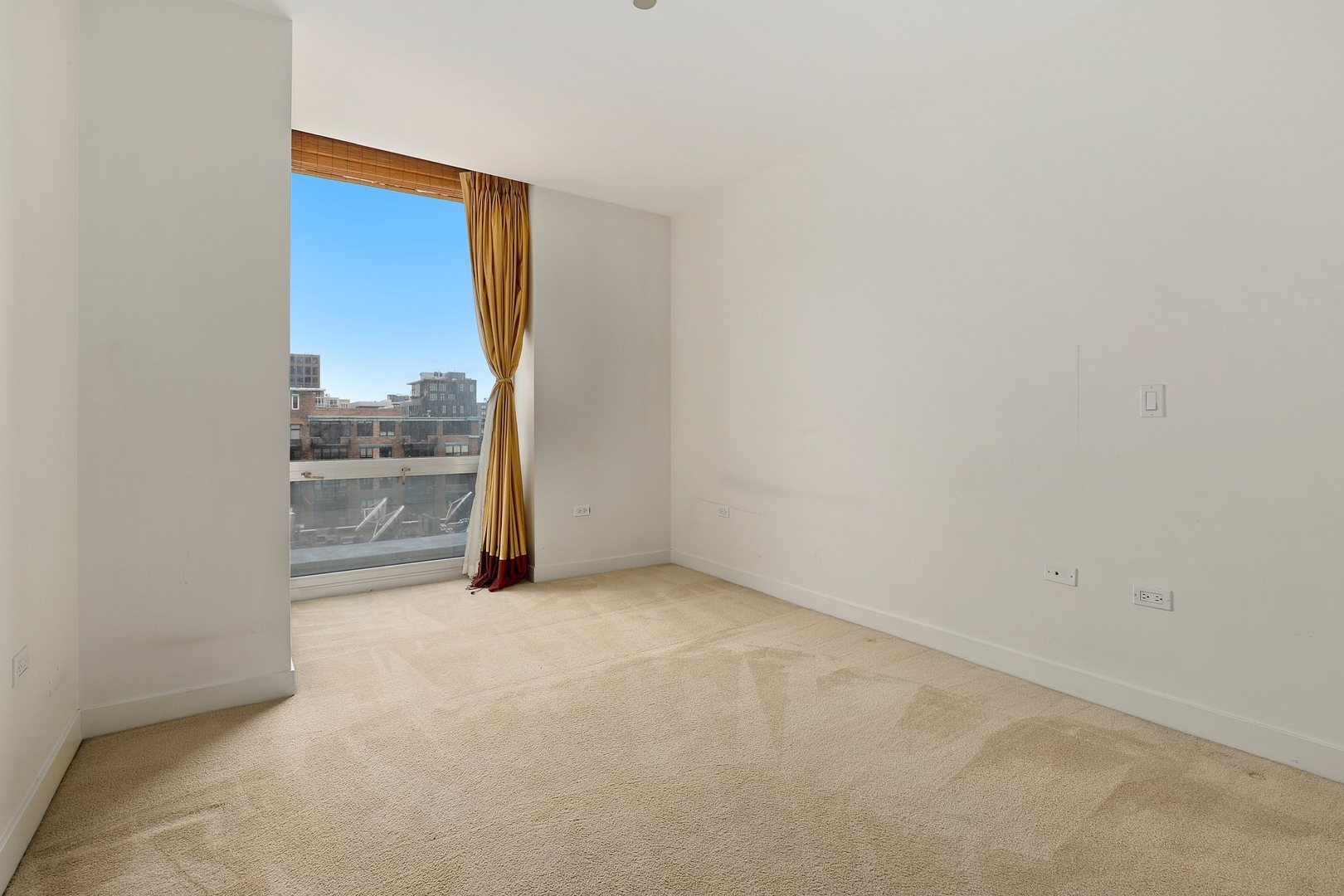 737 West Washington Boulevard, Unit 710 Chicago, IL 60661 - Photo 19 of 28 a view of an empty room with a window