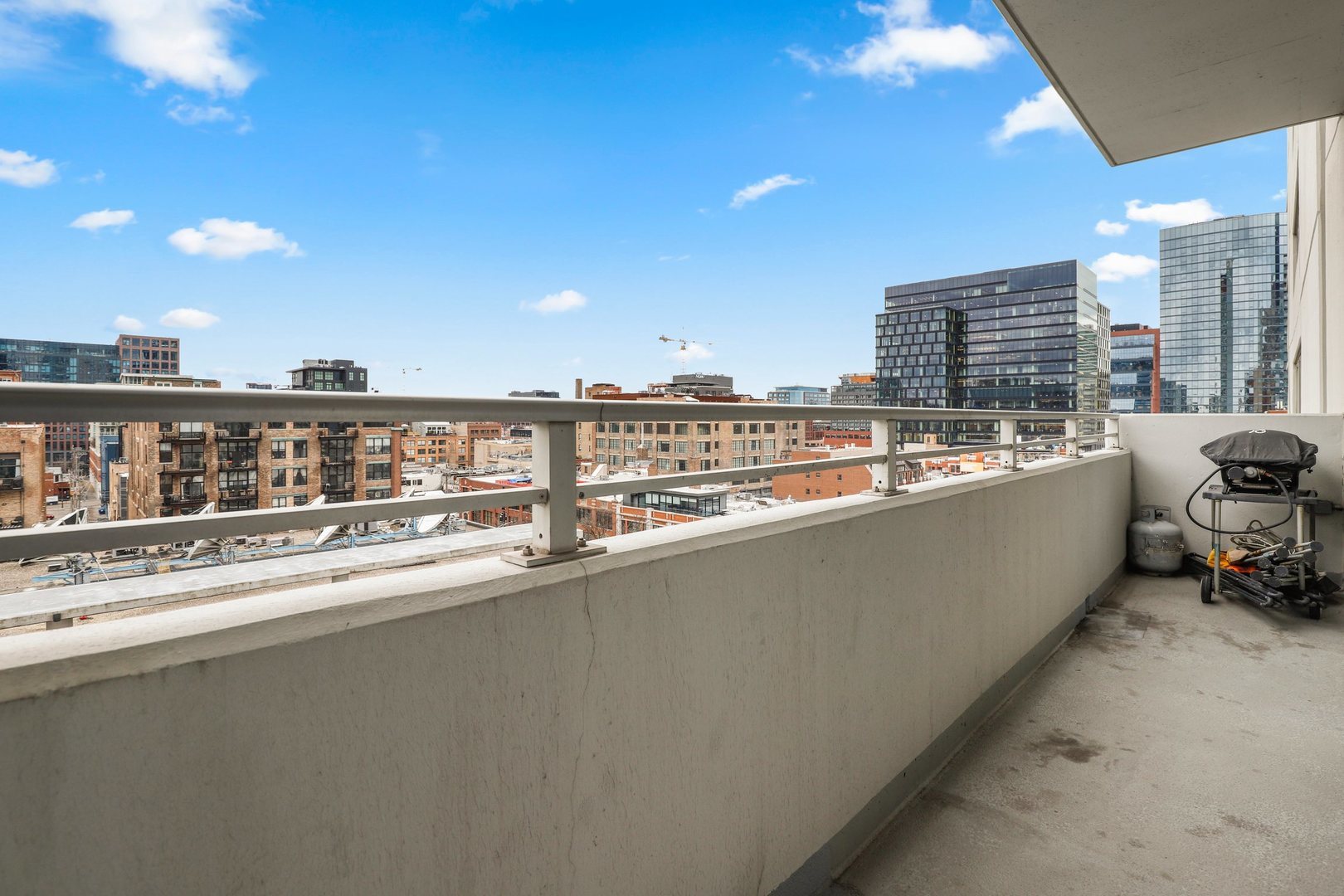 737 West Washington Boulevard, Unit 710 Chicago, IL 60661 - Photo 21 of 28 a view of a balcony with city view