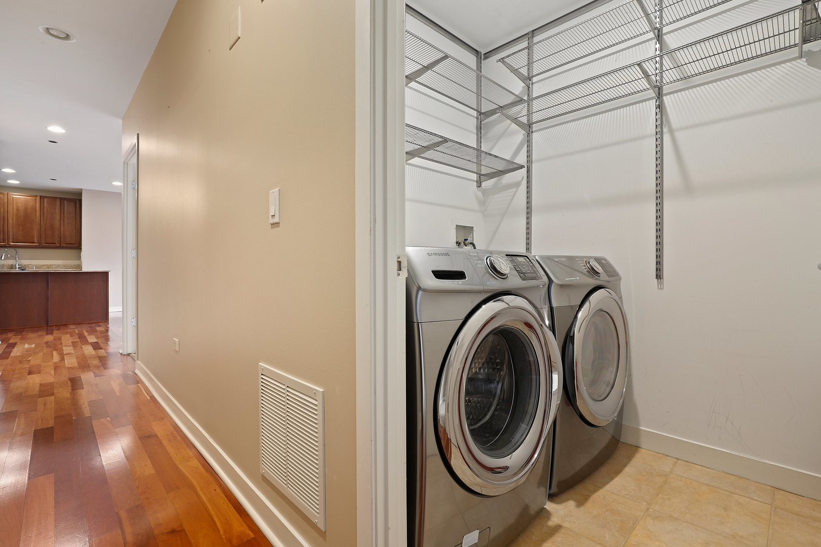 737 West Washington Boulevard, Unit 710 Chicago, IL 60661 - Photo 23 of 28 a utility room with dryer and washer