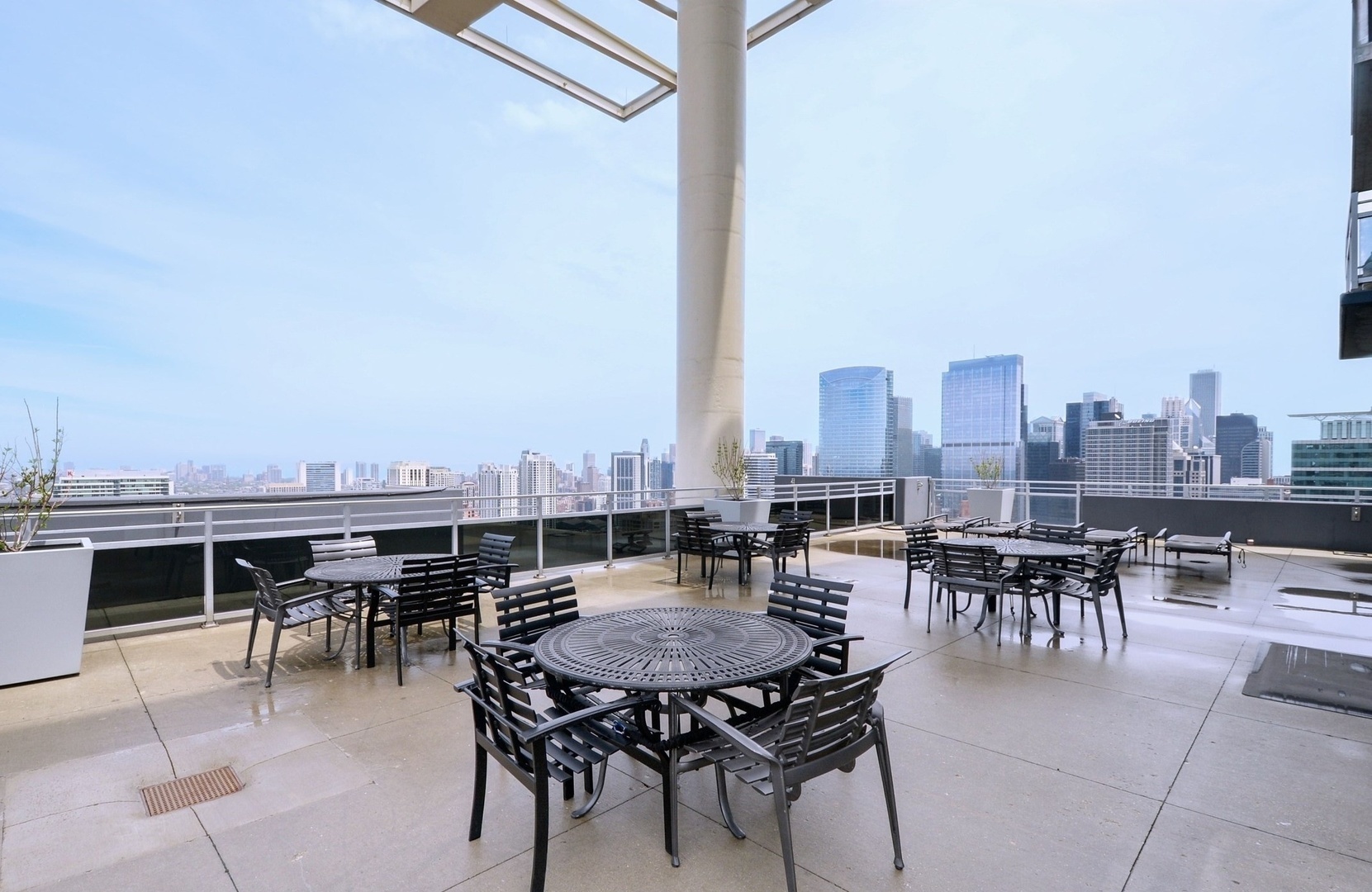 737 West Washington Boulevard, Unit 710 Chicago, IL 60661 - Photo 25 of 28 a terrace with outdoor seating city view and barbeque oven
