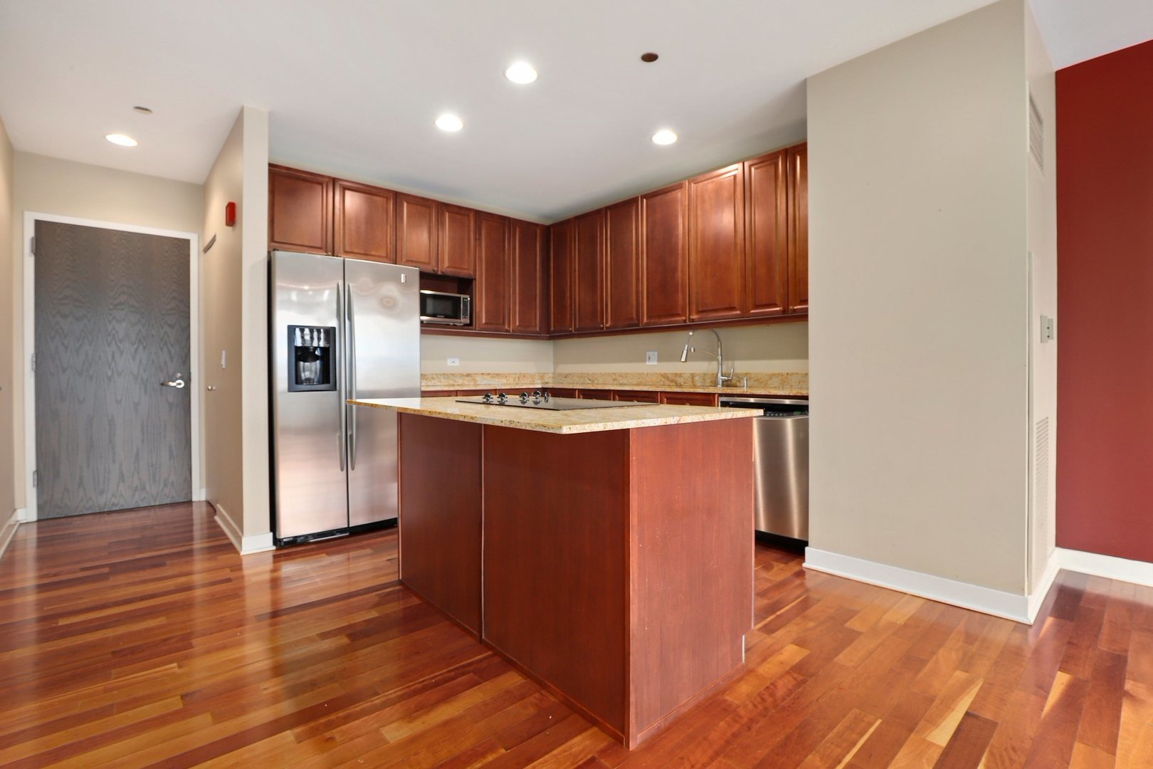 737 West Washington Boulevard, Unit 710 Chicago, IL 60661 - Photo 4 of 28 a kitchen with stainless steel appliances granite countertop a refrigerator and a stove top oven