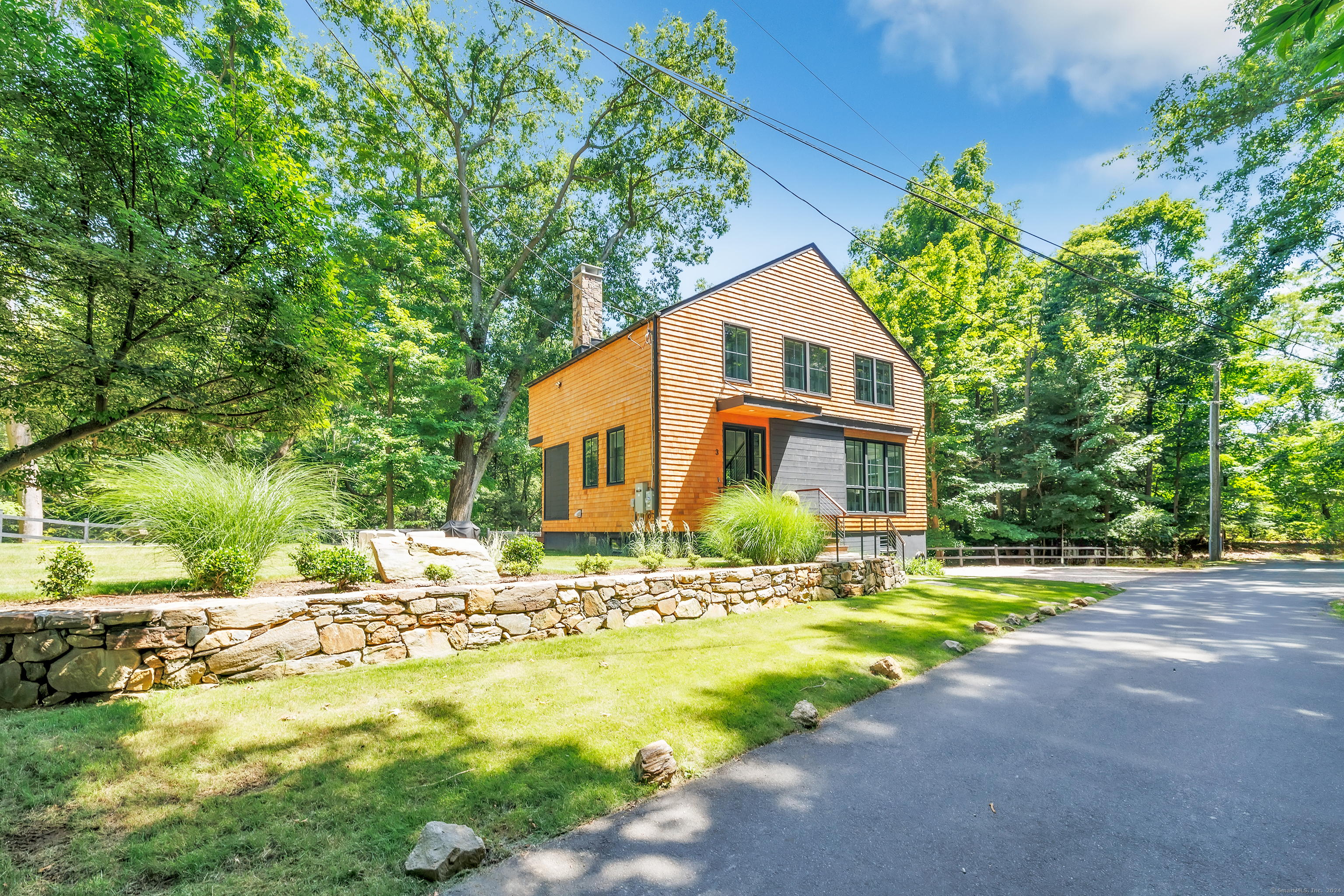 3 Northgate Westport, CT 06880 - Photo 1 of 1 a front view of a house with a yard