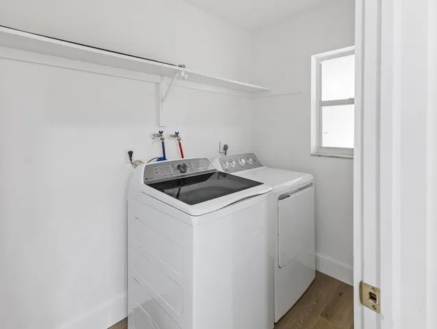 a utility room with dryer and washer