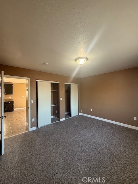 1232 East 68th Street Los Angeles, CA 90001 - Photo 4 of 5 a view of an empty room