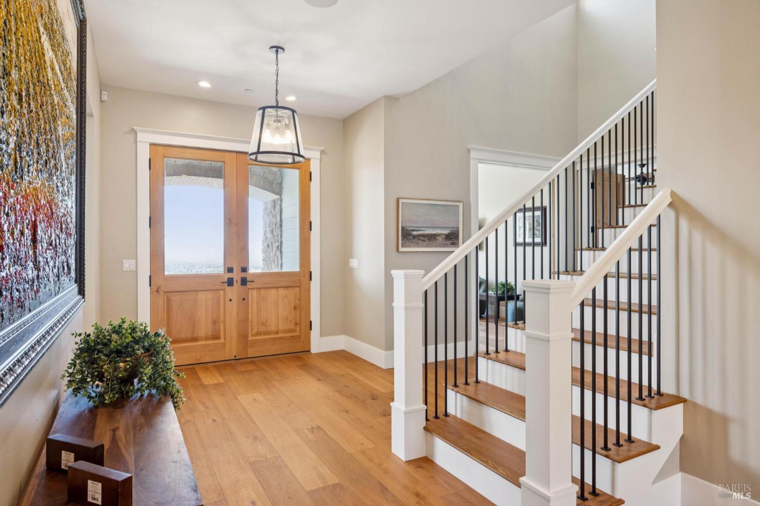 3882 Royal Manor Place Santa Rosa, CA 95404 - Photo 52 of 98 The large custom double doors with windows illuminate this elegant entry with natural light.
