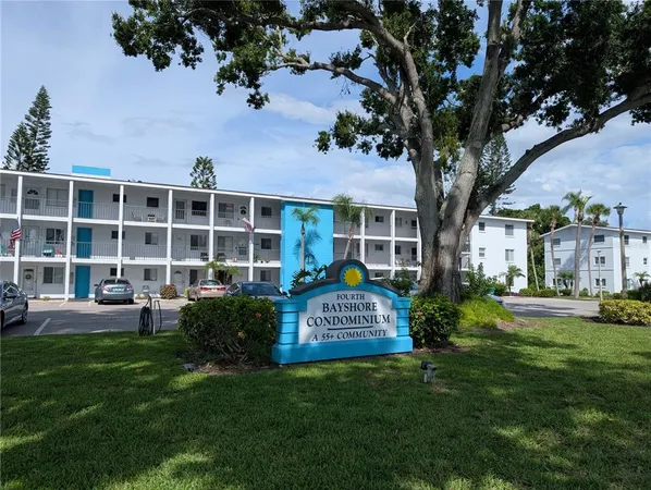 a view of house with backyard and garden