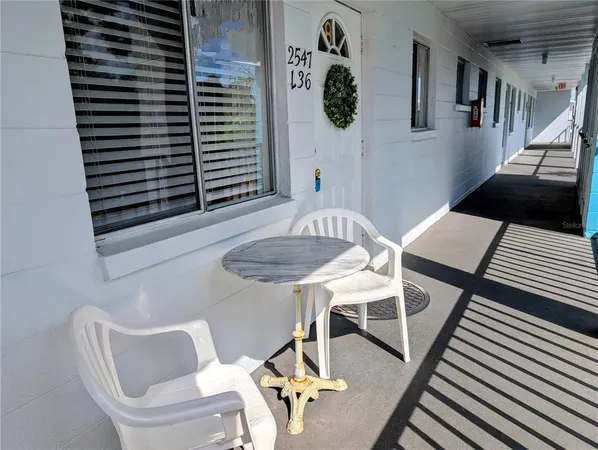 a view of a livingroom with furniture